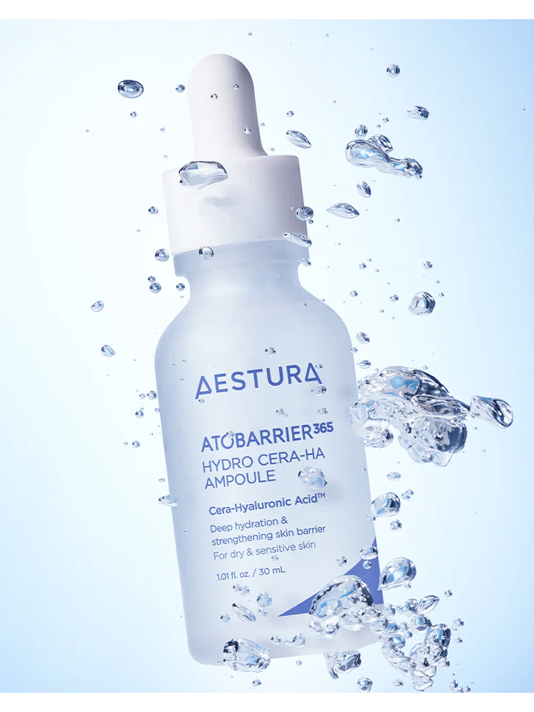 AESTURA Atobarrier 365 Hydro Cera-Ha Ampoule 200ml surrounded by water droplets for hydration promotion.