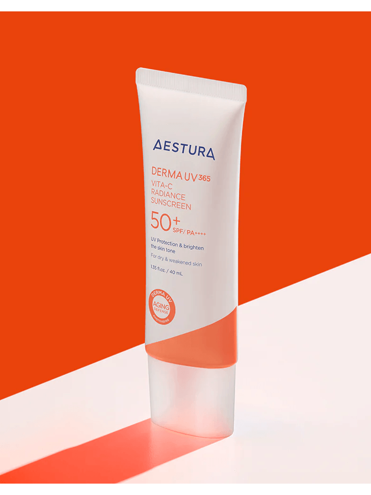 AESTURA Derma UV 365 Vita-C Radiance Sunscreen 40ml SPF50+ PA++++ in a sleek tube against a vibrant backdrop.