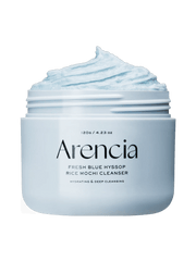 ARENCIA Blue Hyssop Rice Mochi Cleanser 120g in a jar with a light blue mochi texture for deep cleansing.