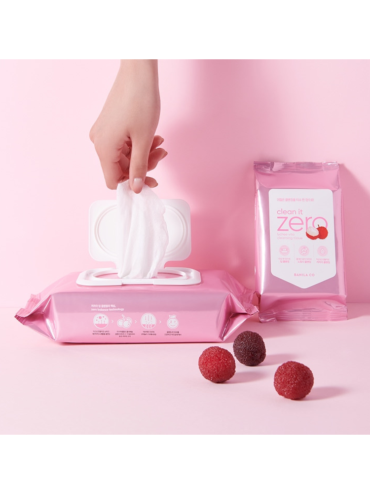 BANILACO Clean It Zero Lychee Vita Cleansing Tissue pack with a hand pulling out a tissue and lychee fruit.