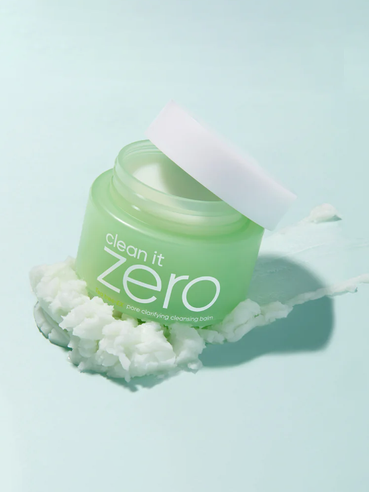 Jumbo Size BANILACO Clean it Zero Pore Clarifying Cleansing Balm 180ml in a green jar on a light blue background.