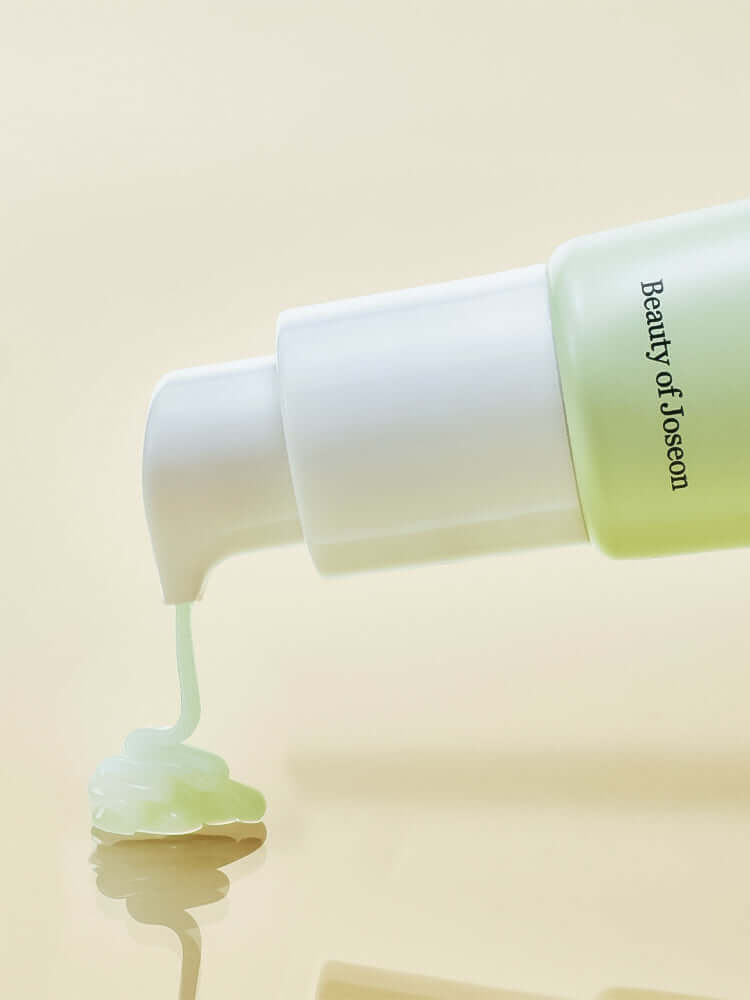 Beauty of Joseon Light On Serum pouring from bottle, showcasing its calming Centella and Vita C formula.