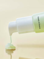 Beauty of Joseon Light On Serum pouring from bottle, showcasing its calming Centella and Vita C formula.
