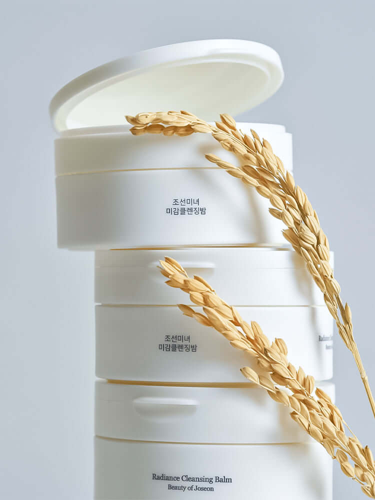 Beauty of Joseon Radiance Cleansing Balm jars with rice stalks, highlighting Korean cosmetics New Zealand.