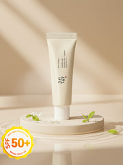 Beauty of Joseon Relief Sun : Rice + Probiotics 50ml SPF50+/PA++++ on a display with a natural background.
