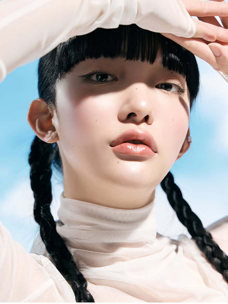 Beauty of Joseon Relief Sun: Model showcasing radiant skin under sunlight, highlighting hydration and protection.