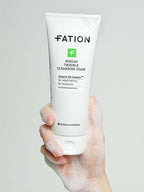 FATION Nosca9 Trouble Cleansing Foam 150ml held in hand, foamy texture, effective cleansing for troubled skin.