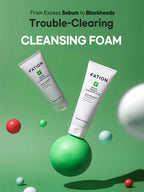 FATION Nosca9 Trouble Cleansing Foam 150ml displayed with colorful spheres on a green background.