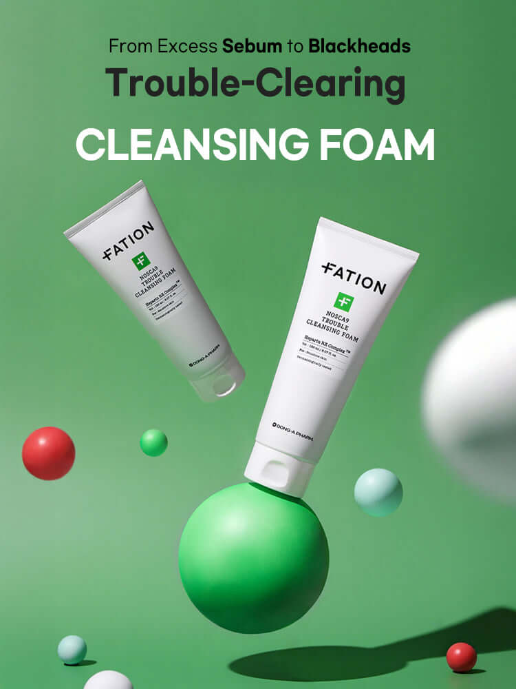 FATION Nosca9 Trouble Cleansing Foam 150ml displayed with colorful spheres on a green background.