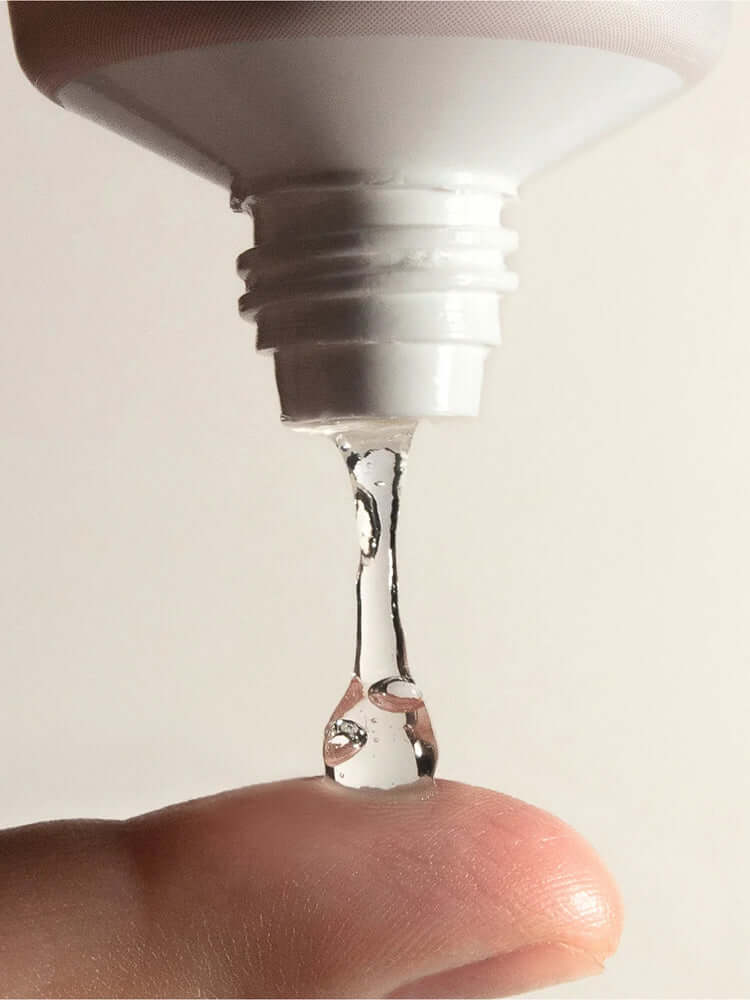 HARUHARU WONDER Black Rice Moisture 5.5 Soft Cleansing Gel 100ml dripping from tube onto fingertip