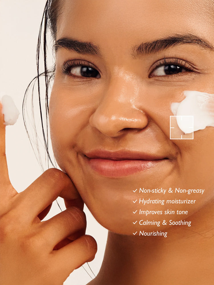 Woman applying HARUHARU WONDER Black Rice 10 Hyaluronic Cream 50ml, showcasing its non-sticky and hydrating properties.