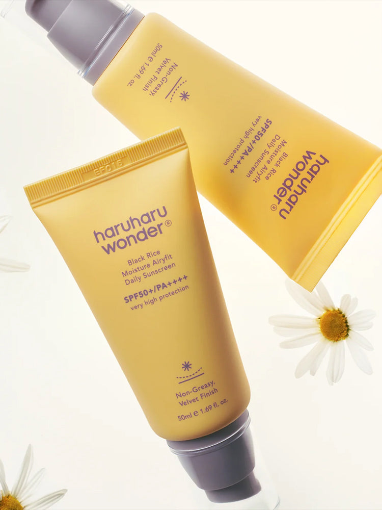 HARUHARU WONDER Black Rice Moisture Airyfit Daily Sunscreen 50ml in elegant packaging with floral accents.
