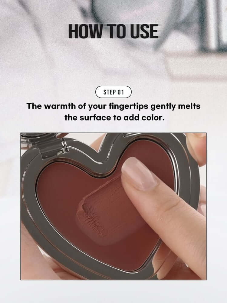 LILYBYRED Luv Beam Cheek Mousse 3.8g application step showing fingertip usage to add color.