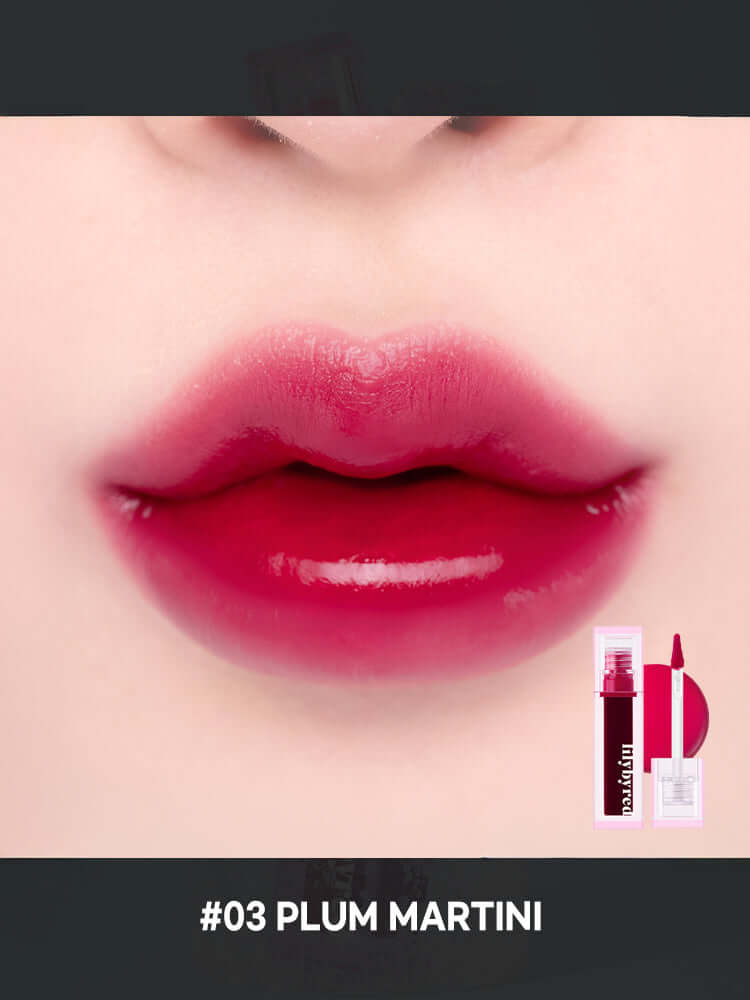 LILYBYRED Juicy Liar Water Tint 4.8g applied on lips showcasing a vibrant #03 Plum Martini shade with glossy finish.