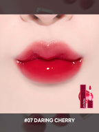 LILYBYRED Bloody Liar Coating Tint 4g shown on lips, featuring #07 Daring Cherry shade with a glossy finish.