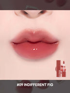 LILYBYRED Bloody Liar Coating Tint 4g in shade #09 Indifferent Fig on soft, glossy lips.