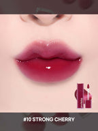 LILYBYRED Bloody Liar Coating Tint 4g shown on lips in shade #10 Strong Cherry with glossy finish.