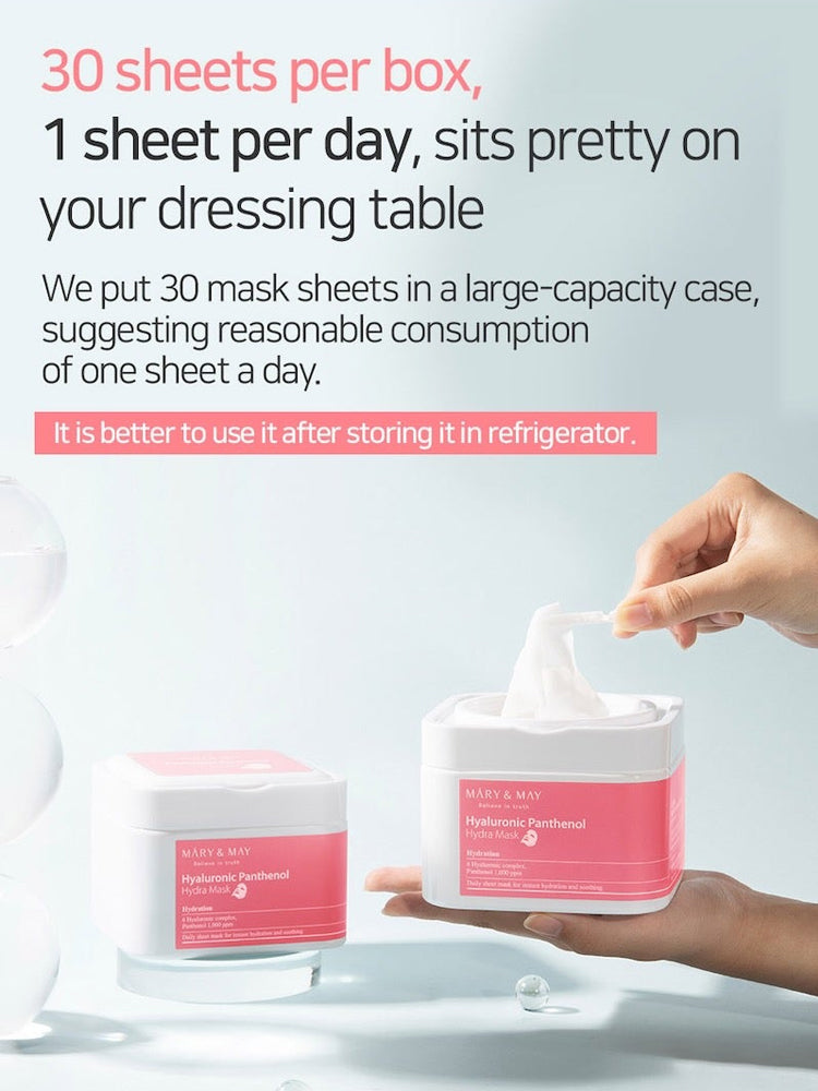 MARY&MAY Hyaluronic Panthenol Hydra Mask box with 30 sheets for daily skincare routine on a dressing table.