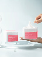 MARY&MAY Hyaluronic Panthenol Hydra Mask packaging with product being pulled out of the container.