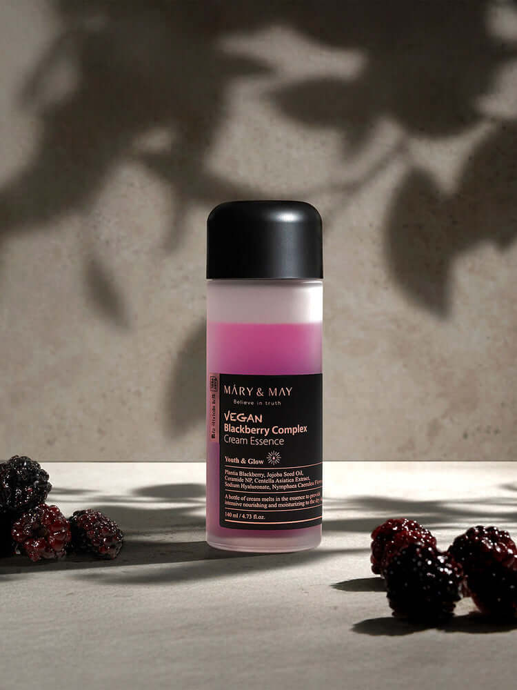 MARY&MAY Vegan Blackberry Complex Cream Essence 140ml with blackberries, showcasing lightweight and hydrating skincare.