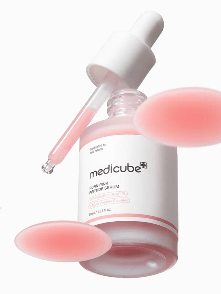 MEDICUBE PDRN Pink Peptide Serum 30ml in a dropper bottle with pink serum and gel patches.