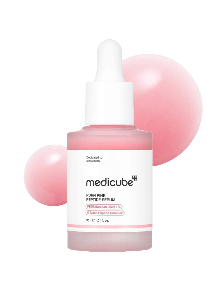 MEDICUBE PDRN Pink Peptide Serum 30ml with pink bubbles showcasing its moisturizing properties.