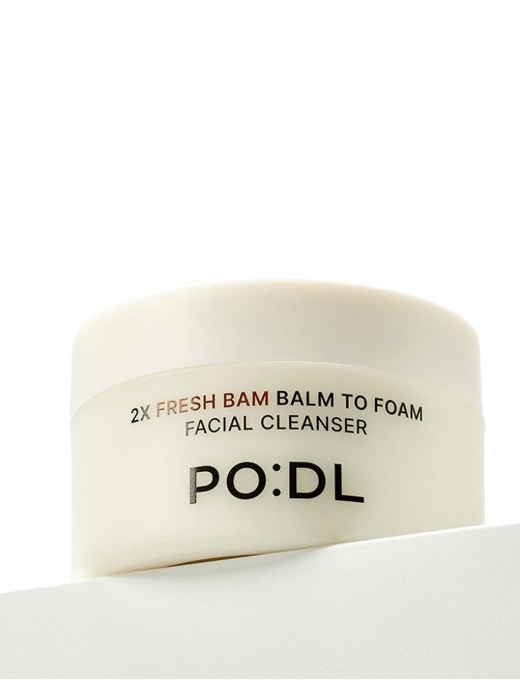 PODL 2X Fresh Bam Balm To Foam facial cleanser in a white jar on a white surface.