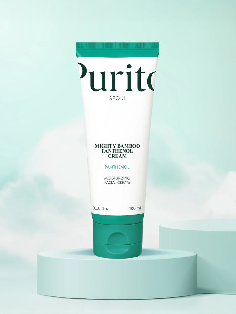 PURITO Mighty Bamboo Panthenol Cream 100ml in a green and white tube against a soft blue background.