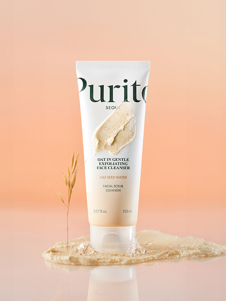 PURITO Oat In Gentle Exfoliating Face Cleanser 150ml tube with creamy texture and oat seed water on a soft background.