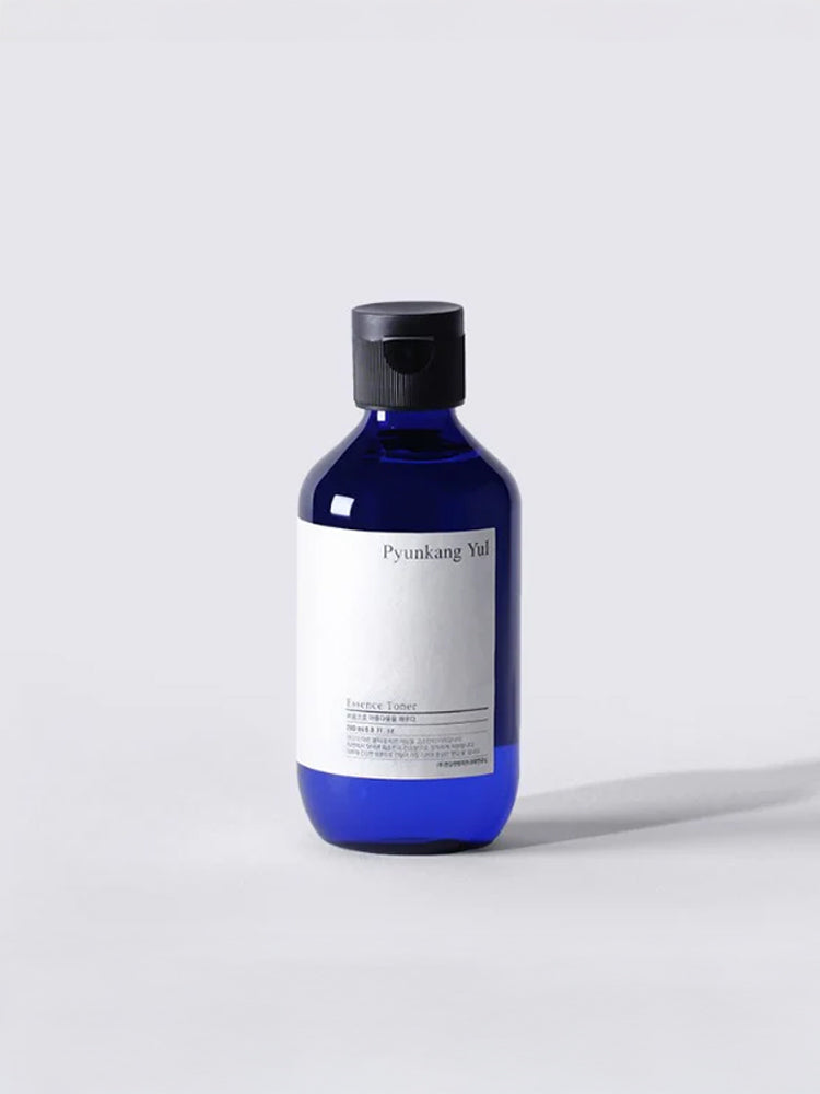 PYUNKANG YUL Essence Toner 200ml in blue glass bottle with minimalist label design