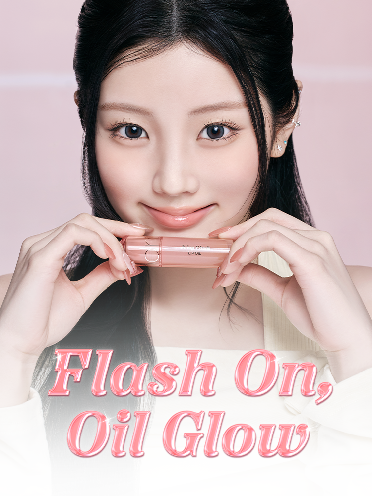 Model showcasing ROMAND Juicy Flash Lip Oil with a glossy finish and a bright background.