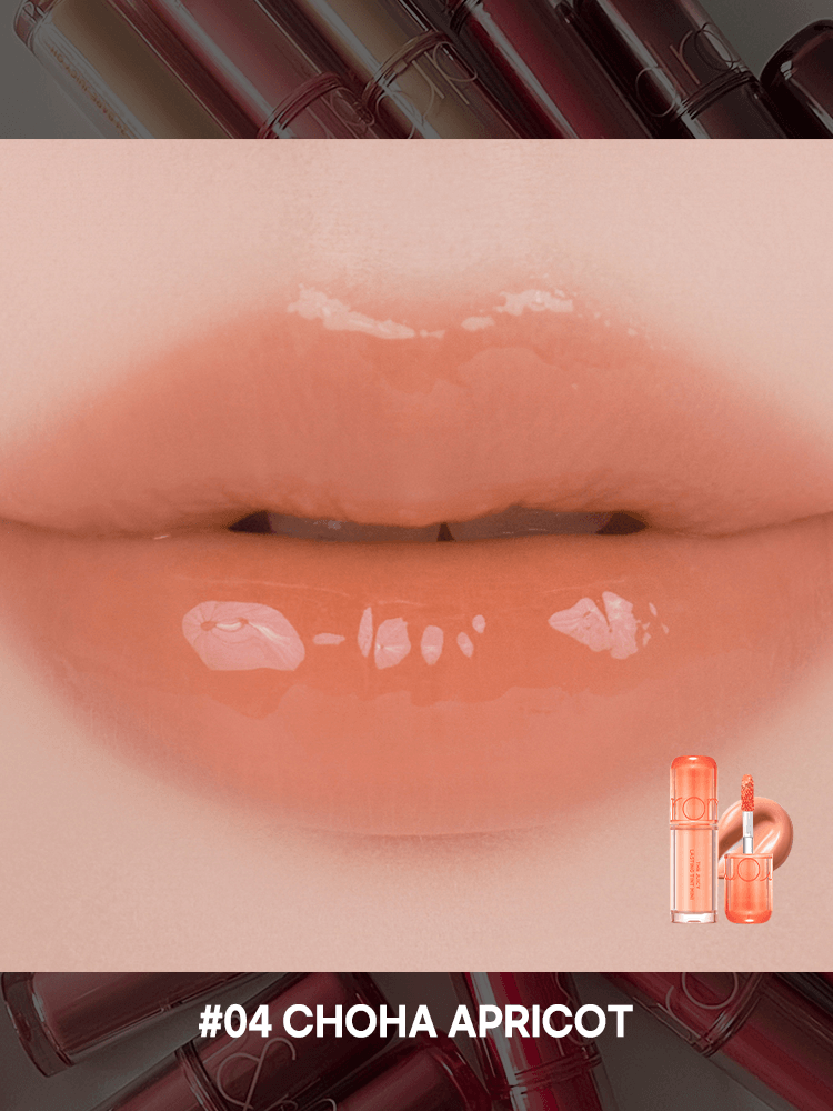 romand juicy lasting tint in #04 Choha Apricot shade, showcasing glossy, soft lips with a fruity hue.