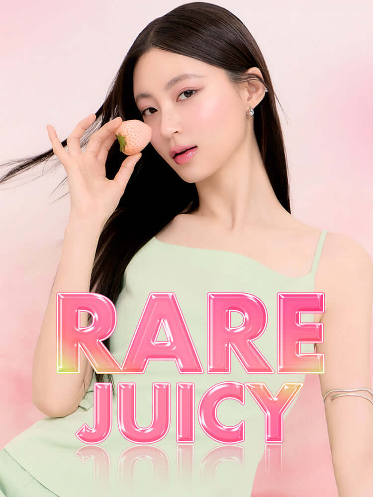 rom&nd The Juicy Lasting Tint 2.0 3.5g displayed by a model holding fruit, showcasing the RARE JUICY theme.