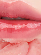 rom&nd The Juicy Lasting Tint 2.0 3.5g applied on lips showcasing Mystic Peach shade with glossy finish.