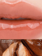 rom&nd The Juicy Lasting Tint 2.0 3.5g in shade 30 Bare Marron with glossy, juicy lips.