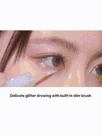 Close-up of applying rom&nd Universe Liquid Glitter 2g with built-in slim brush for precise glitter definition.