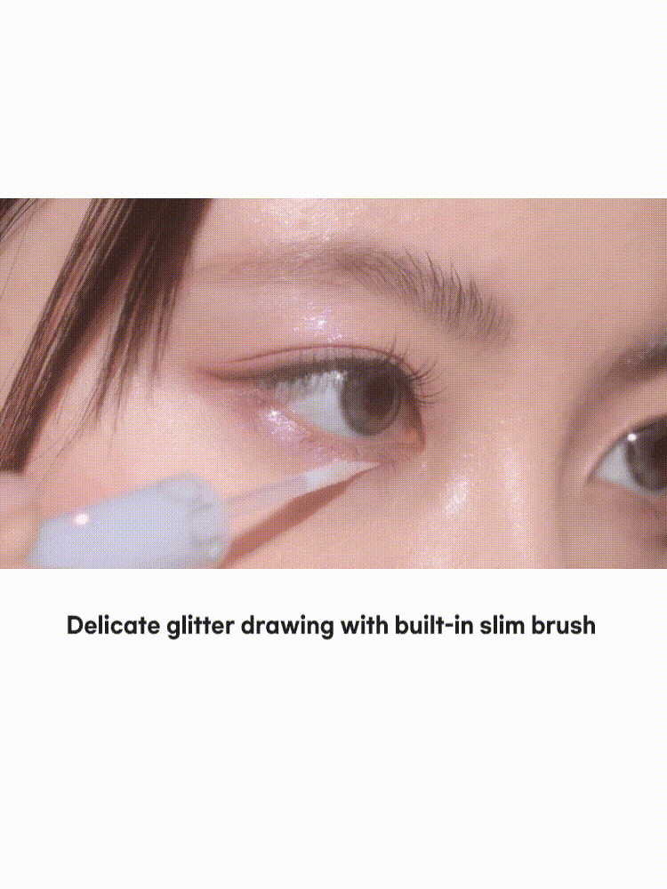 Close-up of applying rom&nd Universe Liquid Glitter 2g with built-in slim brush for precise glitter definition.