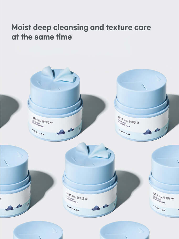 ROUND LAB 1025 Dokdo Cleansing Balm 100ml for deep cleansing and texture care in stylish blue packaging.