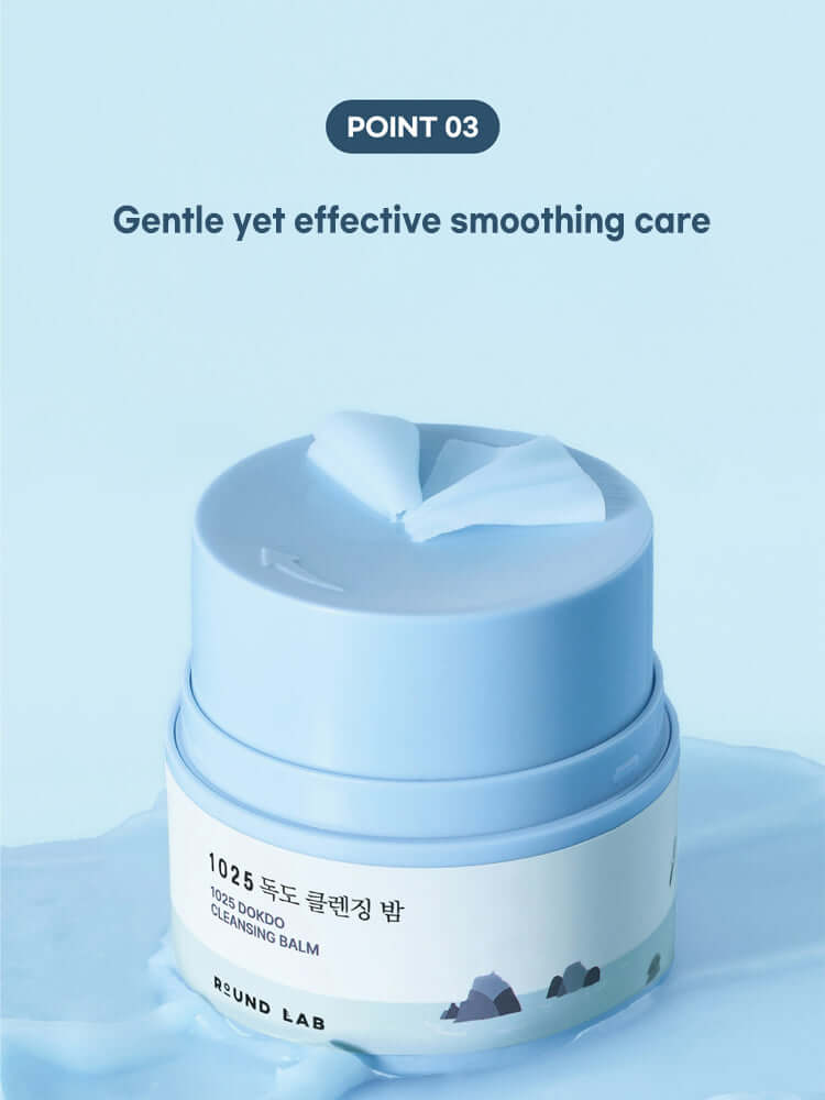 ROUND LAB 1025 Dokdo Cleansing Balm 100ml in a blue container on a blue background.