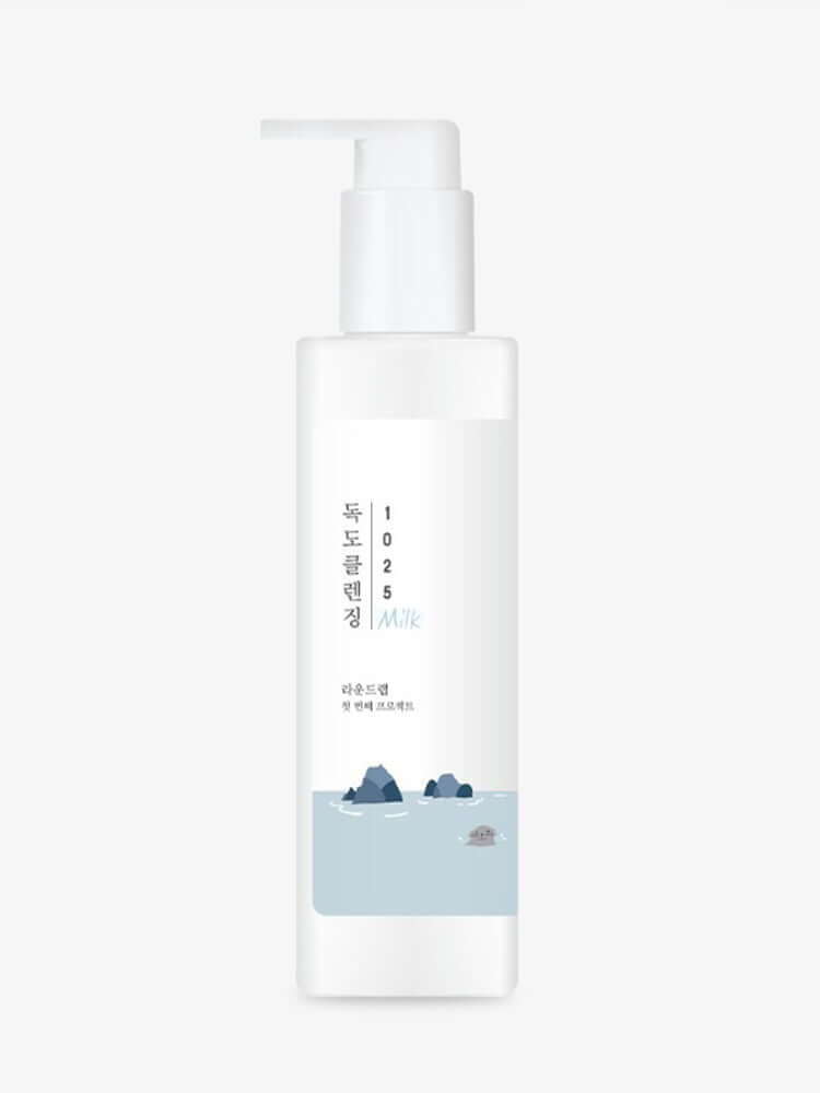 ROUND LAB 1025 Dokdo Cleansing Milk 200ml bottle showcasing a creamy texture for gentle makeup removal.