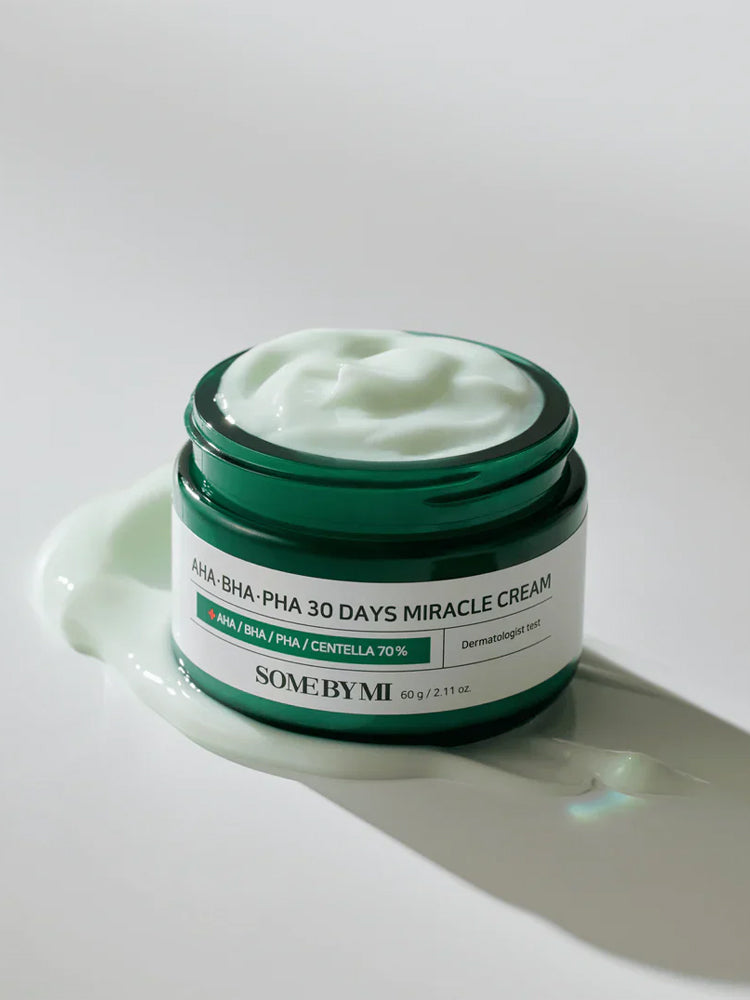 SOME BY MI AHA-BHA-PHA 30Days Miracle Cream 60g in a green jar with a smooth cream texture.