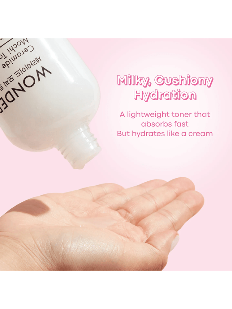 TONY MOLY Wonder Ceramide Mochi Toner 500ml pouring into hand, showcasing hydration and texture.