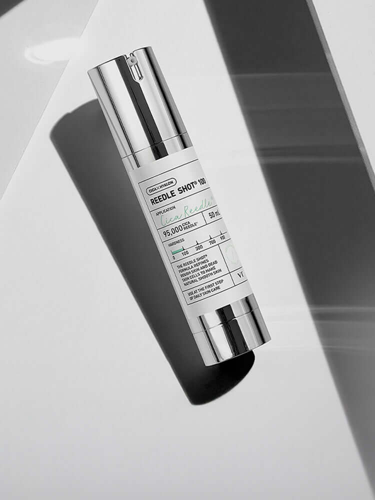 VT Reedle Shot 100 50ml - skincare product in a sleek bottle on a reflective surface
