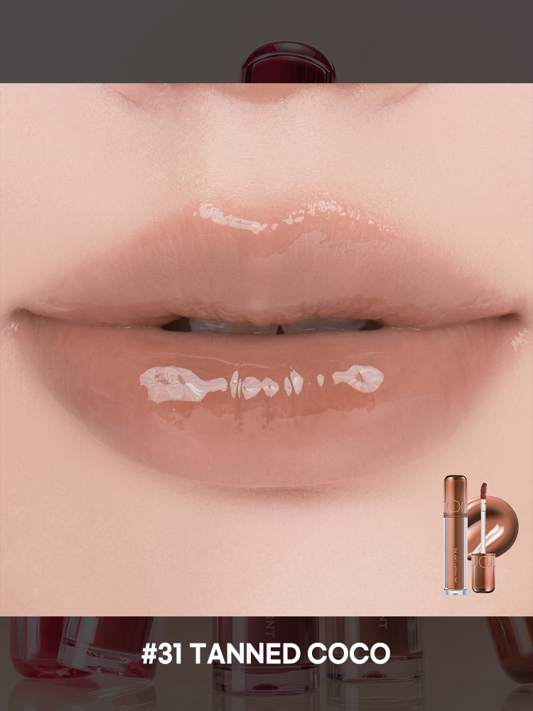 romnd The Juicy Lasting Tint NEW WARM lip gloss in shade #31 Tanned Coco applied on lips.