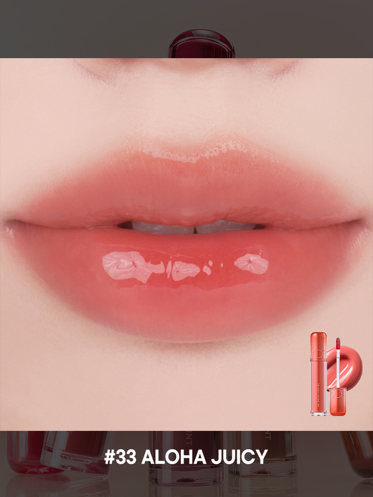 romnd The Juicy Lasting Tint NEW WARM swatch on lips showcasing glossy finish and the shade #33 Aloha Juicy.